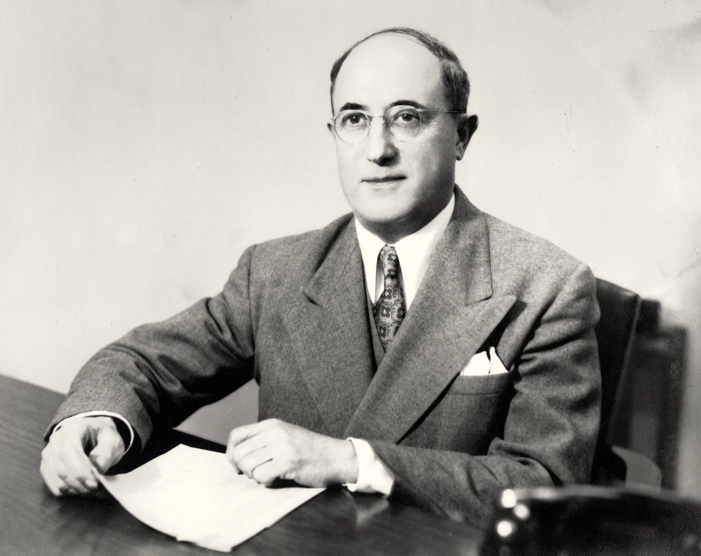Alfred Bromberg at his desk